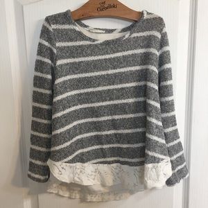 A size Medium/ Large top from Triple Flip
